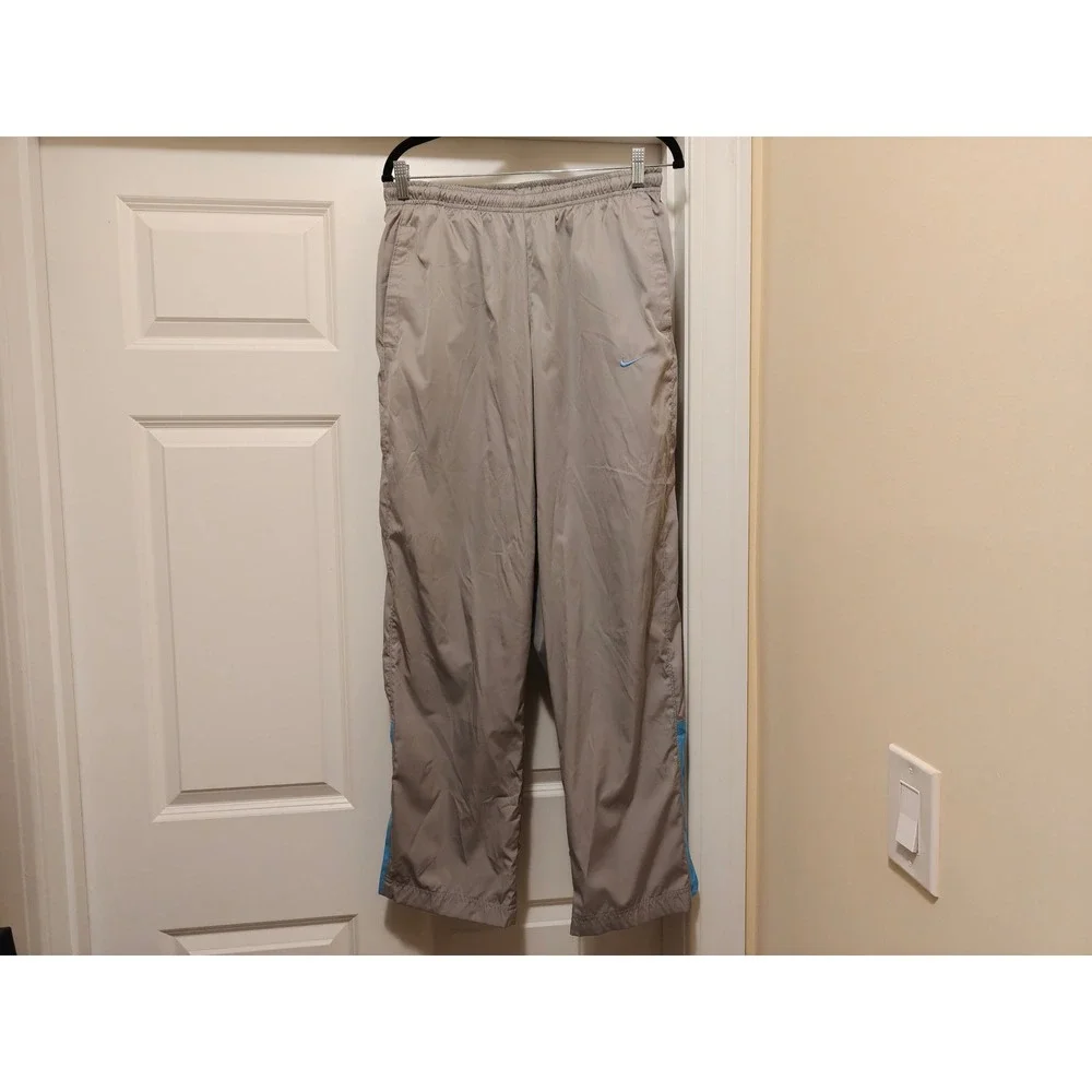 Nike Mens Gray Ripstop Track Pants Blue Side Stripe Zipper Cuffs Size M